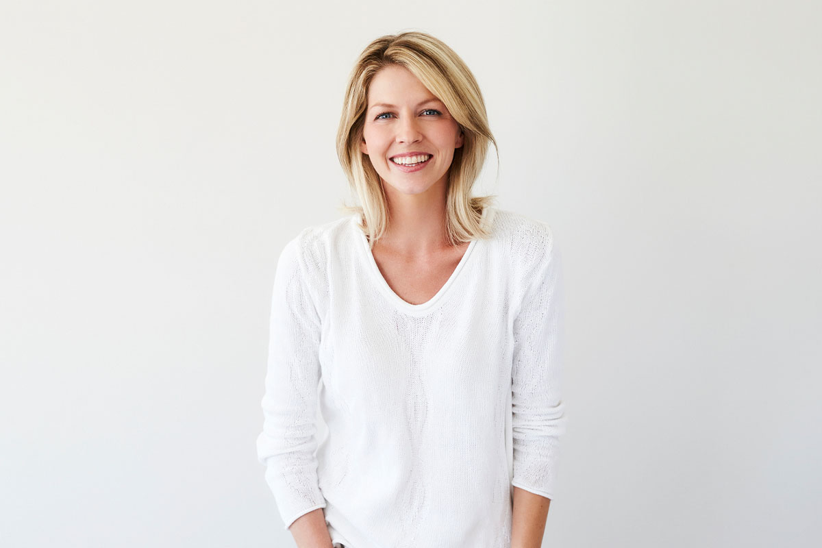 a woman smiling after getting Morpheus8V in McAllen, TX.